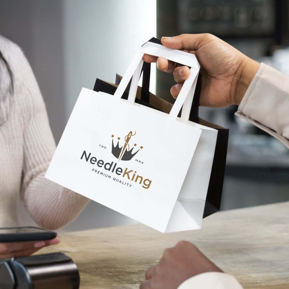 Small Flat Handle Paper Bag Landscape being handed over, ideal for corporate gifts and eco-friendly carry solutions.