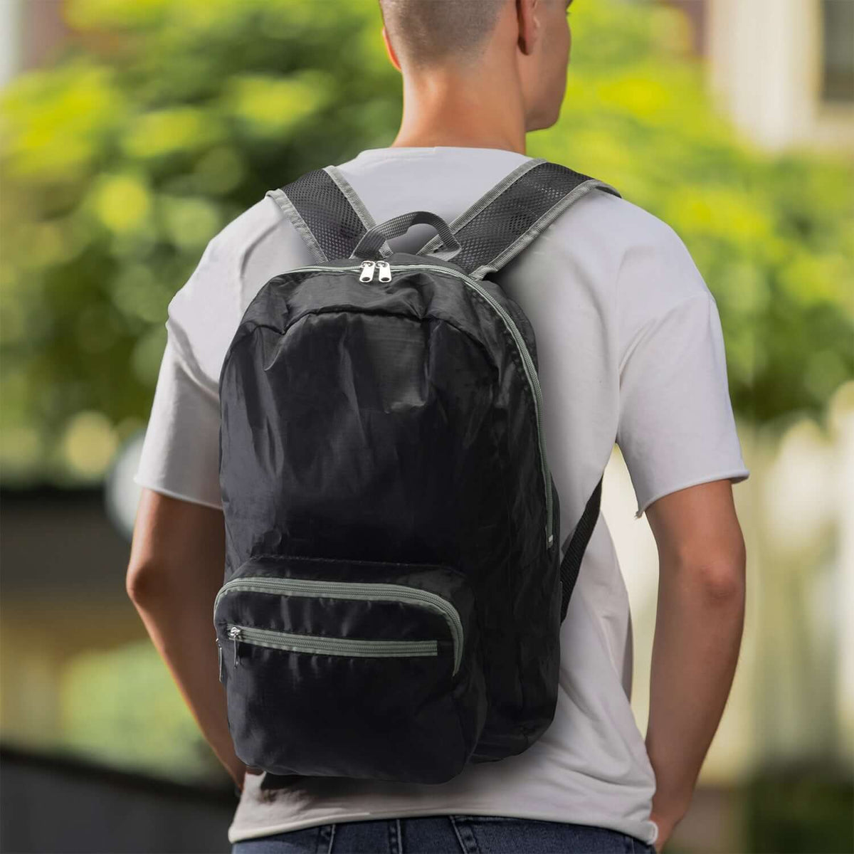Stylish Origami Foldable Backpack in black, ideal for travel and as a corporate gift in Singapore.