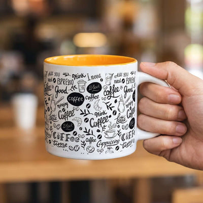 Cora Coffee Mug featuring a two-toned design with coffee-related graphics, perfect for corporate gifts.