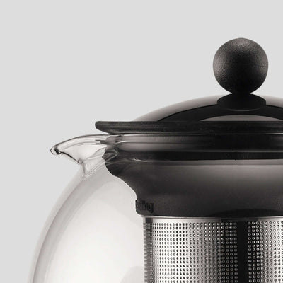 Bodum Assam Tea Press close-up showing the glass teapot lid and stainless steel infuser.
