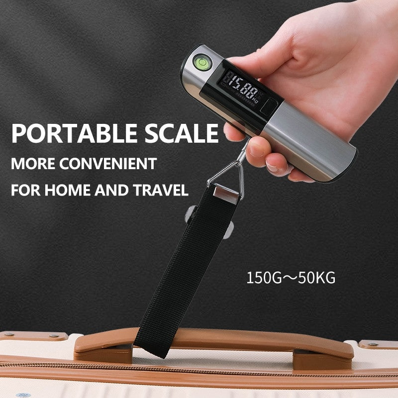 Digital luggage scale held horizontally with a black strap attached to a suitcase handle and a weight displayed on screen