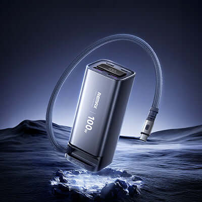 Remax FC-22 Powerbank with Type-C Retractable Cable 20000mAh on a dark background with water.