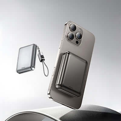 Remax FC-07 Mini Powerbank with Lanyard Cable 20000mAh beside a smartphone, showcasing its sleek design.