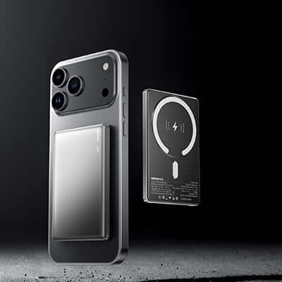 Remax CX08 Magnetic Wireless Charging Powerbank 5000mAh alongside a smartphone with wireless charging feature.