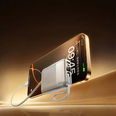 Remax FC-06 Compact Powerbank with Cables 20000mAh charging a smartphone.