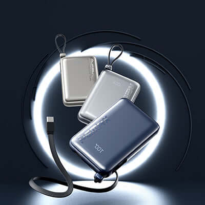 Remax RPP-19 Fast Charging Powerbank 10000mAh in three colors with a TYPE-C cable against a dark background.
