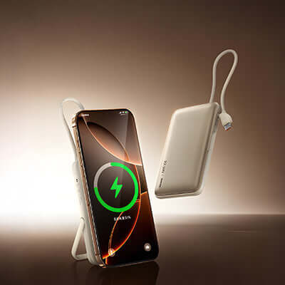 Remax MC-01 Magnetic Wireless Powerbank with Cable and Stand charging a smartphone, featuring a sleek design and foldable stand.