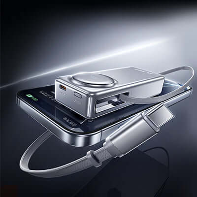 Remax FCP-10 Powerbank with Type-C Retractable Cable 10000mAh on smartphone, showcasing portability and fast charging.