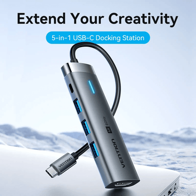 Vention 5-in-1 USB-C Portable Docking Station with multiple ports for enhanced connectivity and creative abilities.