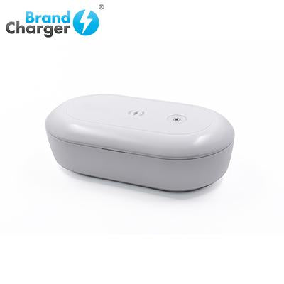 BrandCharger white oval UV sterilizer and wireless charging unit with lid closed