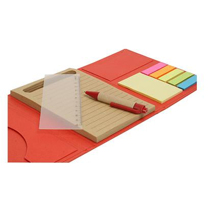 Open red notebook set with lined writing pad, pen, yellow sticky notes and multicoloured page flags