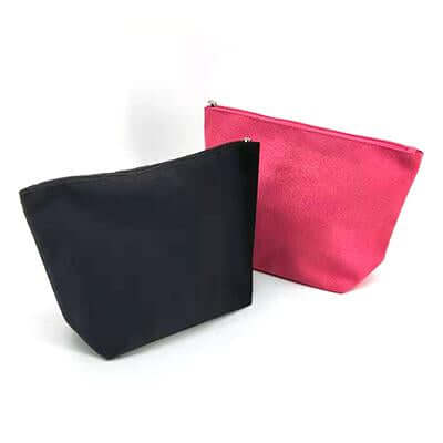 Black and pink canvas zipper pouches with tapered sides and flat bases
