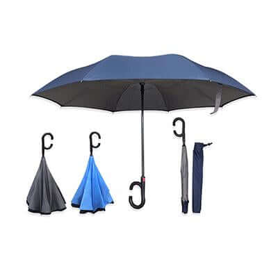 Inverted umbrella with C-shaped handle shown open, reverse-closed in dark and blue colours, and beside a storage sleeve