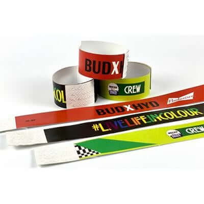 Assorted 1 Inch Tyvek Paper Wristbands in bold colors for events, parties, or promotions.