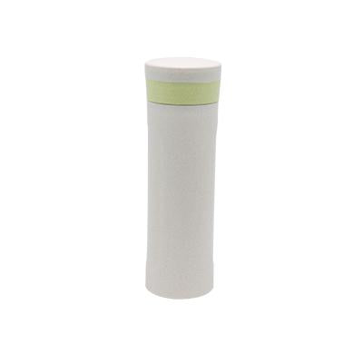 Tall neutral speckled water bottle with pale-green accent band and matching light cap