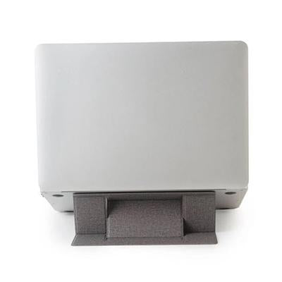 Rear view of a silver laptop resting on the compact grey folded stand