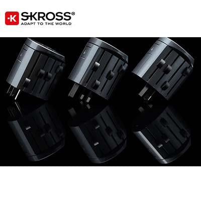 Three black SKROSS Alpha travel adaptors displayed with different plug-pin configurations extended.