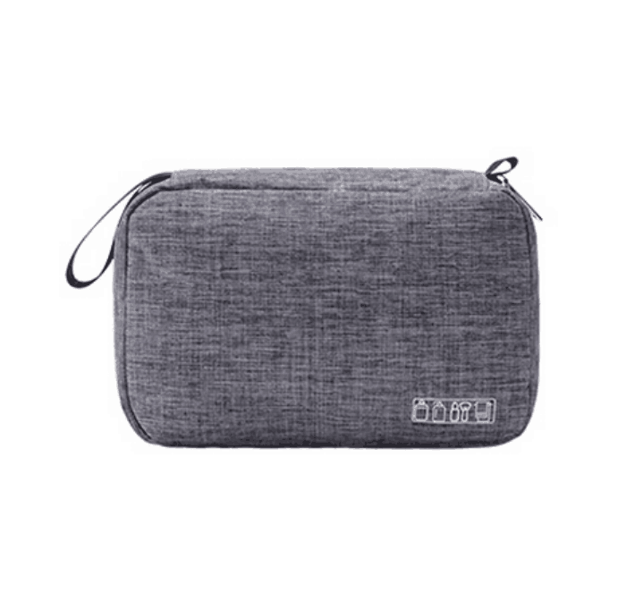 Closed grey toiletry pouch with zip fastening and side carry loop