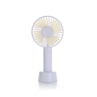 Pale rechargeable portable fan shown upright in its matching desk stand