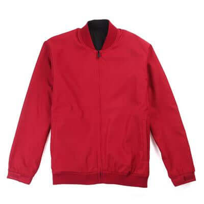 Red bomber jacket laid flat with contrasting black inner collar