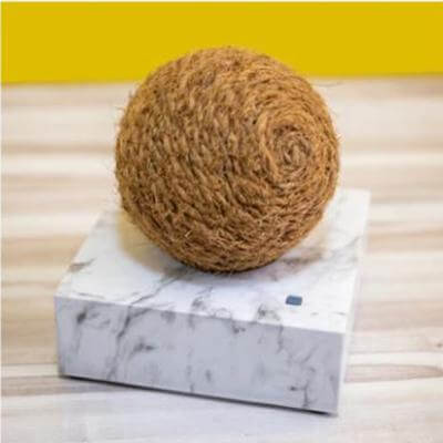 Zero2.5 Natural Fiber-based Negative Ionizer Air Marble CF4000 on a marble base for eco-friendly air purification.