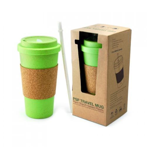 Green mug with cork sleeve and matching lid beside a white straw and window-box packaging