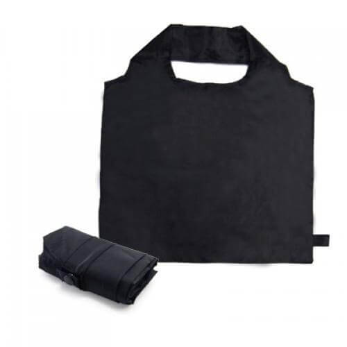 Black foldable shopping bag shown open with integrated handles and folded into a compact strapped bundle